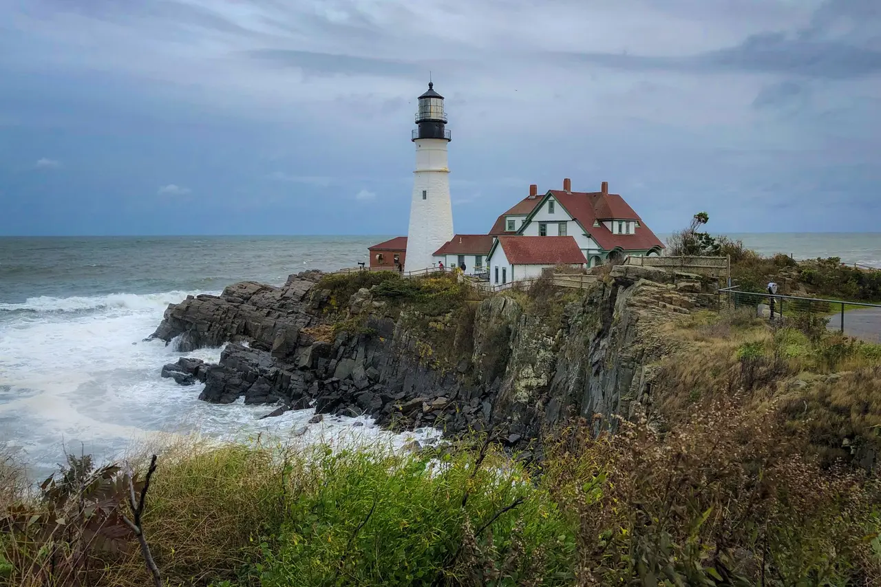 Portland Head Light above the rocky Maine coastline